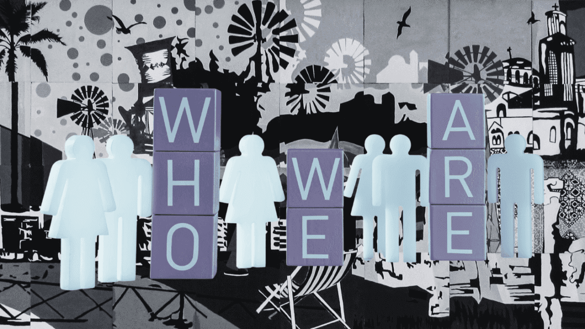 Silhouettes of people with blocks spelling “WHO WE ARE” against a black-and-white city mural background.
