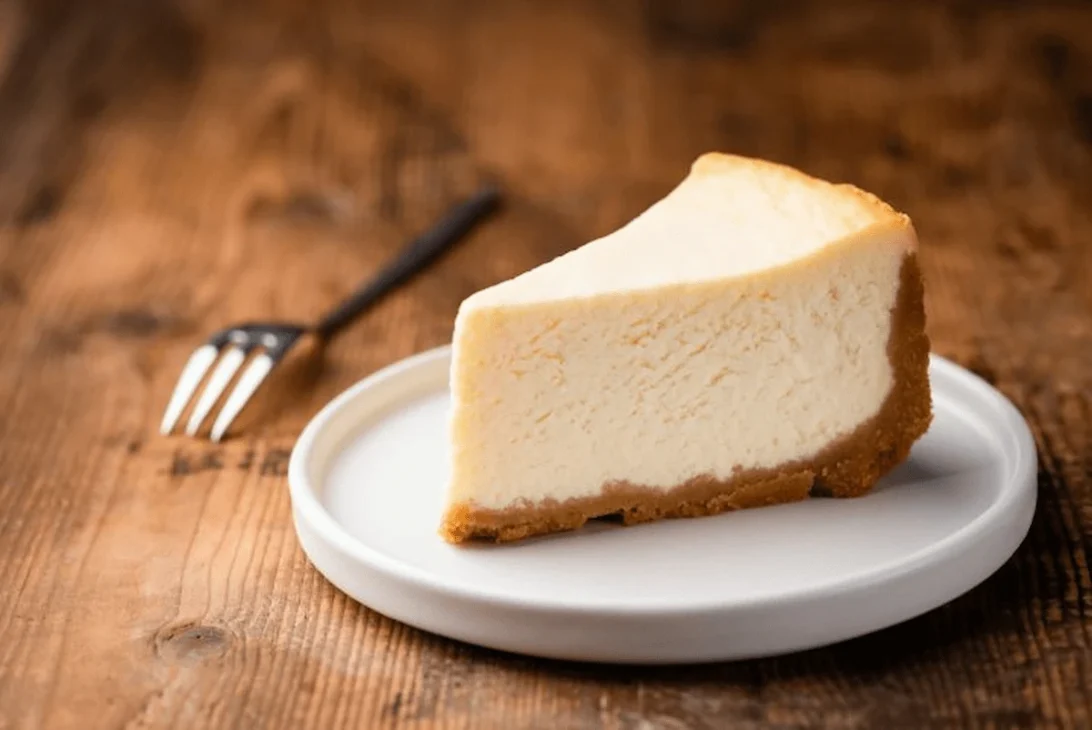 Ancient-style Greek cheesecake made with cheese, honey, and a thin crust, inspired by recipes served at Olympic feasts.