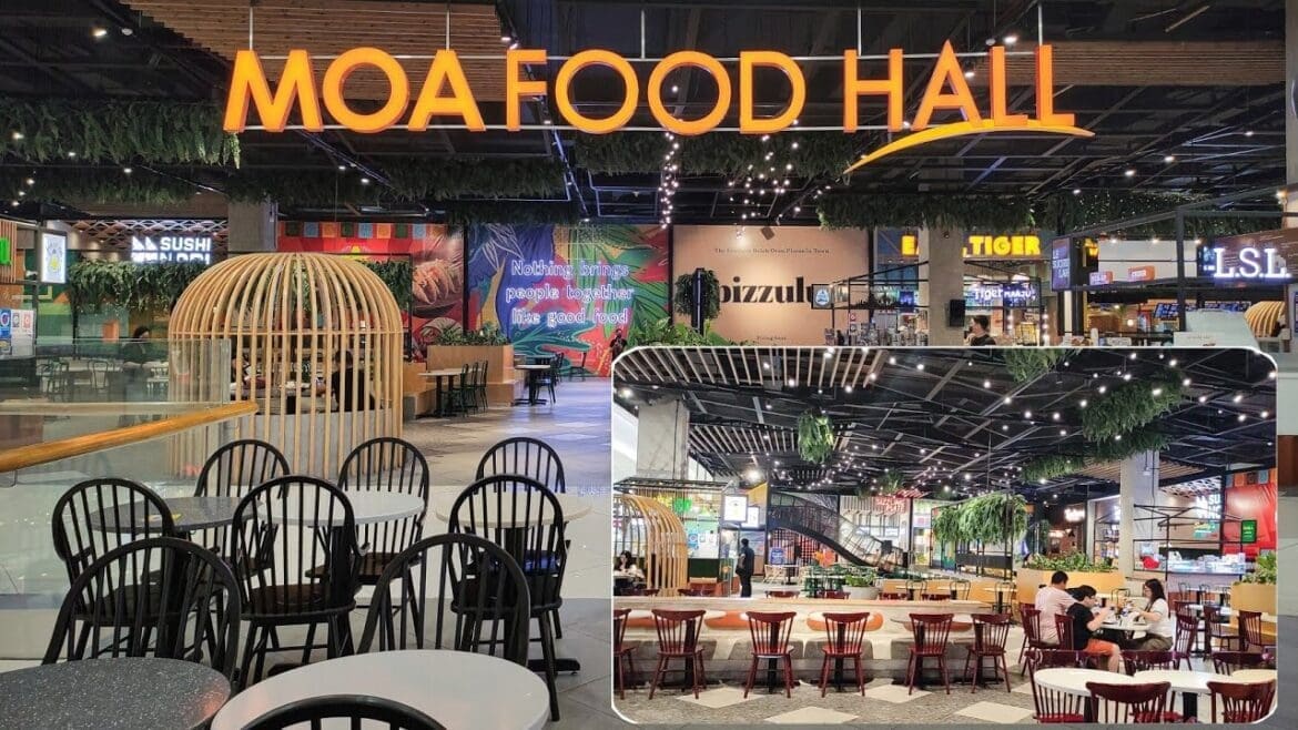 SM Mall of Asia (MOA) Food Hall in Pasay, Philippines, showing diners enjoying meals in a bustling, air-conditioned space.